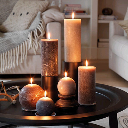 Декоративные свечи в интерьере дома в фото